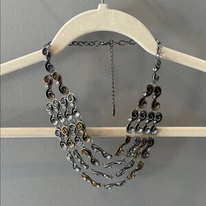 Elegant Silver and Gold Swirl Necklace